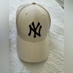 Cream Baseball Cap with Black Logo